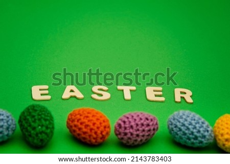 Minimalist creative Easter concept with colorful eggs. Poster or greeting card.