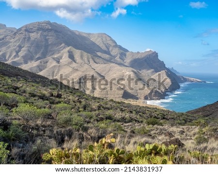 Western coast view on the way to Faneroque beach, Grand Canary island, Canary Islands, Spain. Royalty-Free Stock Photo #2143831937