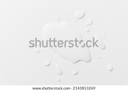 
Water spilled on a white table