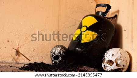 Nuclear waste between skulls closeup photo