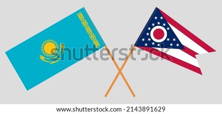 Crossed flags of Kazakhstan and the State of Ohio. Official colors. Correct proportion. Vector illustration
