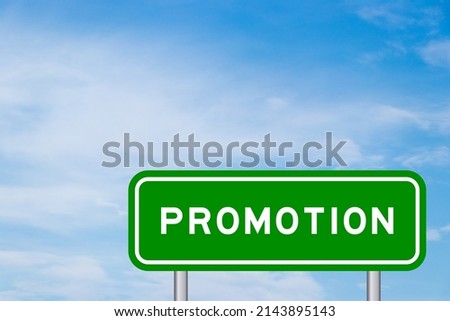 Green color transportation sign with word promotion on blue sky with white cloud background
