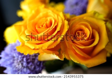 Bouquet of bright flowers with yellow rose closeup 