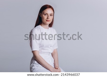 Beauty woman doctor in medical uniform on isolated background. Protection, epidemic, medicine, health care lifestyle concept