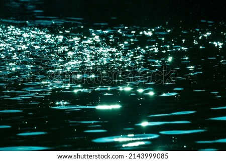 Greene Waves abstract - rippled water texture background. Light reflecting, Reflection in clean water ripples. Lake water sun reflections. Nice sun reflecting on rippled water surface in swimming pool Royalty-Free Stock Photo #2143999085