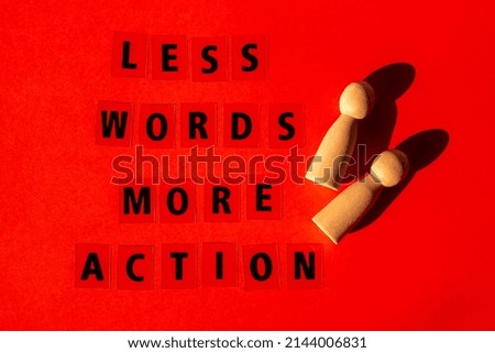 Message LESS WORDS MORE ACTION. Motivational Words Quotes Concept. Colorful red background. Minimalistic creative concept of support and acting. Inspirational phrase