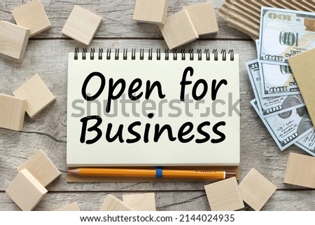 open for business sign hand drawn on to the screen