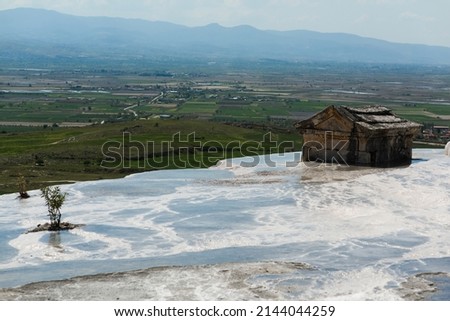 Panoramic view of travertines of Pamukkale (cotton castle) - unique nature wonder in Turkey Royalty-Free Stock Photo #2144044259