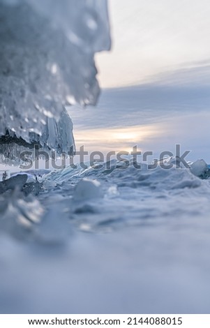 Frozen water from a lake on a rock