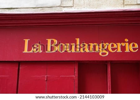 Boulangerie french sign means bakery old vintage on street outside view of rustic text on wall wooden facade