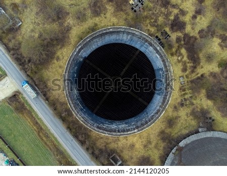 an aerial view of a factory cooling tower