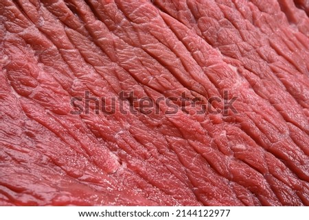 Raw beef fillet cut. Shallow depth of field.