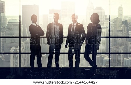 Business district - home of the ambitious. Portrait of a stylishly dressed young businessmen superimposed over a cityscape. Royalty-Free Stock Photo #2144164427
