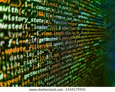 Simple website HTML code with colorful tags in browser view on dark background. HTML code on lcd screen. Program development concept. Programming, webdesign HTML printed code