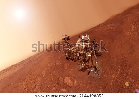 Mars rover on the surface of Mars. Elements of this image furnished by NASA. High quality photo