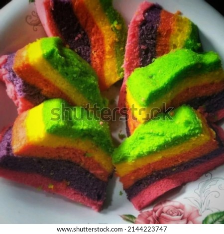 defocused abstract background named color sponge cake, there are red green yellow like a rainbow