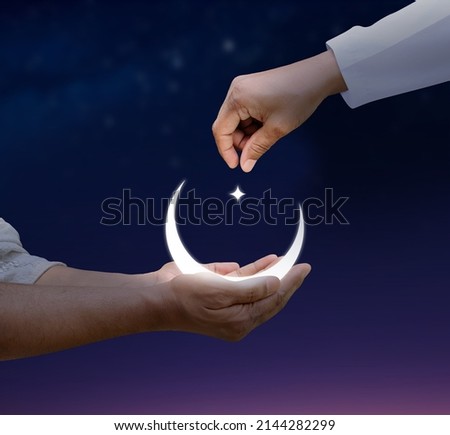Eid al-Fitr and Ramadan concept background. Giving zakat or sadaqah to poor people Islamic concept background. Royalty-Free Stock Photo #2144282299