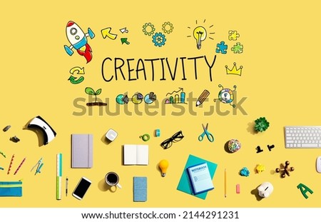 Creativity with collection of electronic gadgets and office supplies