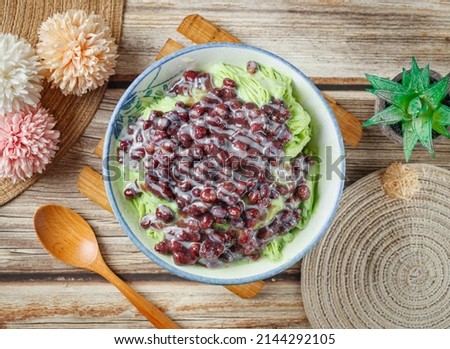 Matcha Red Bean Snowflakes in a dish top view on wooden table taiwan food