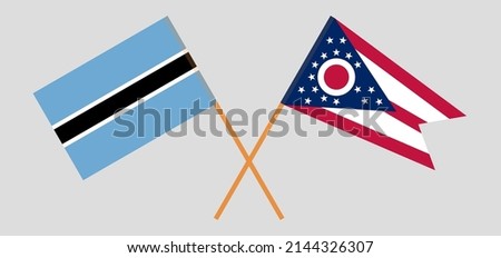Crossed flags of Botswana and the State of Ohio. Official colors. Correct proportion. Vector illustration
