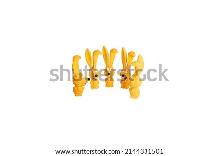 a lot of yellow toys for dog and pet cats