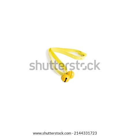 
yellow leather collar and leash with bell for walking outdoors with animals