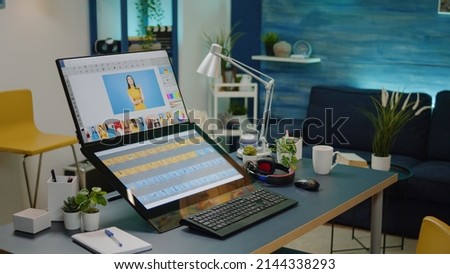 Nobody in editing studio with photo retouching equipment. Empty workplace for photography edits with modern computer and desktop on desk. Professional software for digital creativity