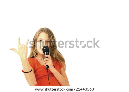 Preteen doing rock on sign