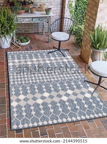 Outdoor area rug modern design. Modern geometric outdoor area carpet. Royalty-Free Stock Photo #2144390515