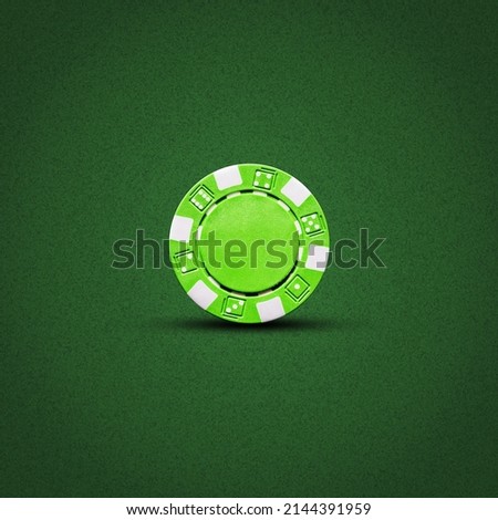 Green poker chip, on a dark green background. Gambling. Background.