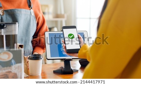 QR code payment, customer using smartphone for paying at shop Royalty-Free Stock Photo #2144417971