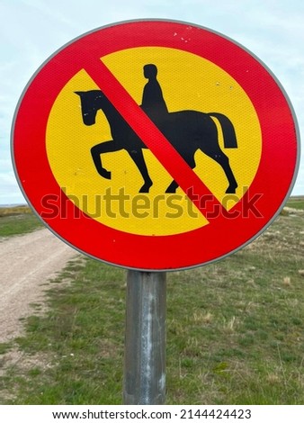 traffic sign, forbidden to drive in with horses or to ride a horse in the nature reserve