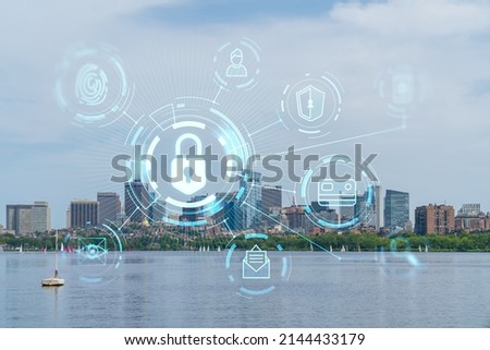 Panorama skyline, city view of Boston at day time, Massachusetts. Building exteriors of financial downtown. Glowing Padlock hologram. Concept of cyber security to protect confidential information