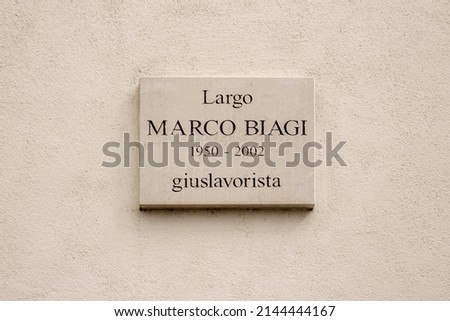 Plaque to Marco Biagi, Italian labor lawyer, in the center of Modena, Italy.