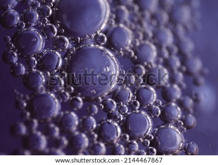 Abstract macro of liquids with bubbles