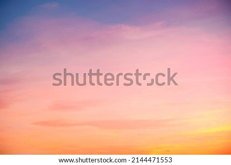 beautiful orange clouds  and sunlight on the blue sky perfect for the background, take in morning,Twilight