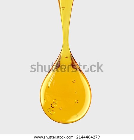 Drop of Cooking Oil with Air Bubbles. Icon of drop of oil or honey Royalty-Free Stock Photo #2144484279