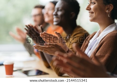 group of diverse business people applauding together. Royalty-Free Stock Photo #2144515341