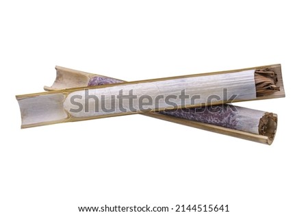 Sticky rice in bamboo, Bamboo sticky rice dessert isolated on white background Royalty-Free Stock Photo #2144515641