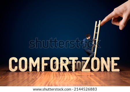 Coach motivate to leave comfort zone and take an opportunity for personal growth. Helping hand concept with businessman climb the ladder. Royalty-Free Stock Photo #2144526883