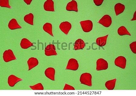 red petals on a green background
