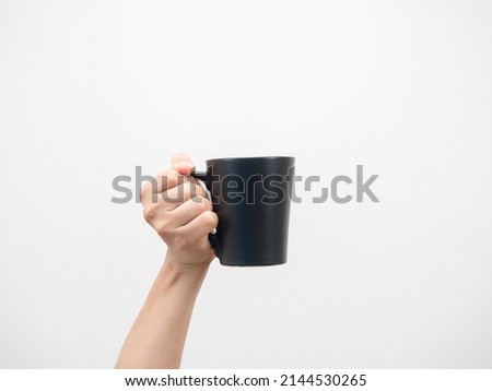 Close up hand holding coffee cup white isolated Royalty-Free Stock Photo #2144530265