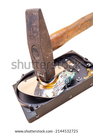 Hard drive being destroyed with hammer