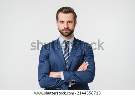 Closeup portrait of caucasian handsome businessman freelancer boss ceo tutor teacher manager in formalwear suit with arms crossed isolated in white background Royalty-Free Stock Photo #2144558713