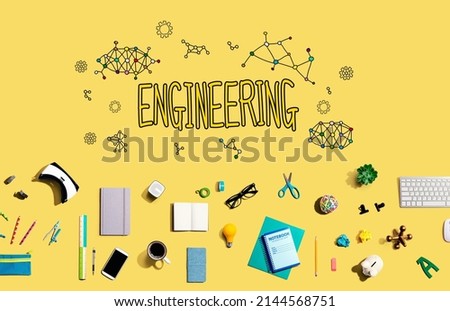 Engineering with collection of electronic gadgets and office supplies