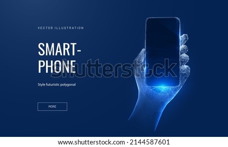 Phone in hand digital technology concept in futuristic polygonal style. Neon silhouette of a smartphone with a glow and an empty black area. Mockup for the presentation of a mobile application.