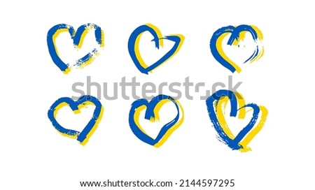 Hand drawn hearts in Ukrainian colors. Set of six grunge yellow and blue doodle hearts on white background. Vector illustration