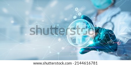 Medicine doctor hold icon health and electronic medical record on interface. Digital healthcare and network connection on hologram virtual screen, insurance. medical technology and network concept. Royalty-Free Stock Photo #2144616781