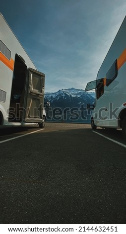 A campervan (or camper van), sometimes referred to as a camper, caravanette, or motor caravan, is a self-propelled vehicle that provides both transport and sleeping accommodation. Royalty-Free Stock Photo #2144632451