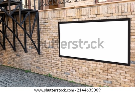 Advertising concept. Banners on brick aisle walls with clipping path on screen. - can be used for trade shows or promotional posters.